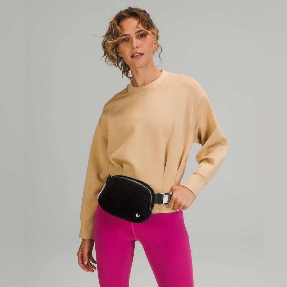 Lululemon Athletica Black Bag with Gold Accents